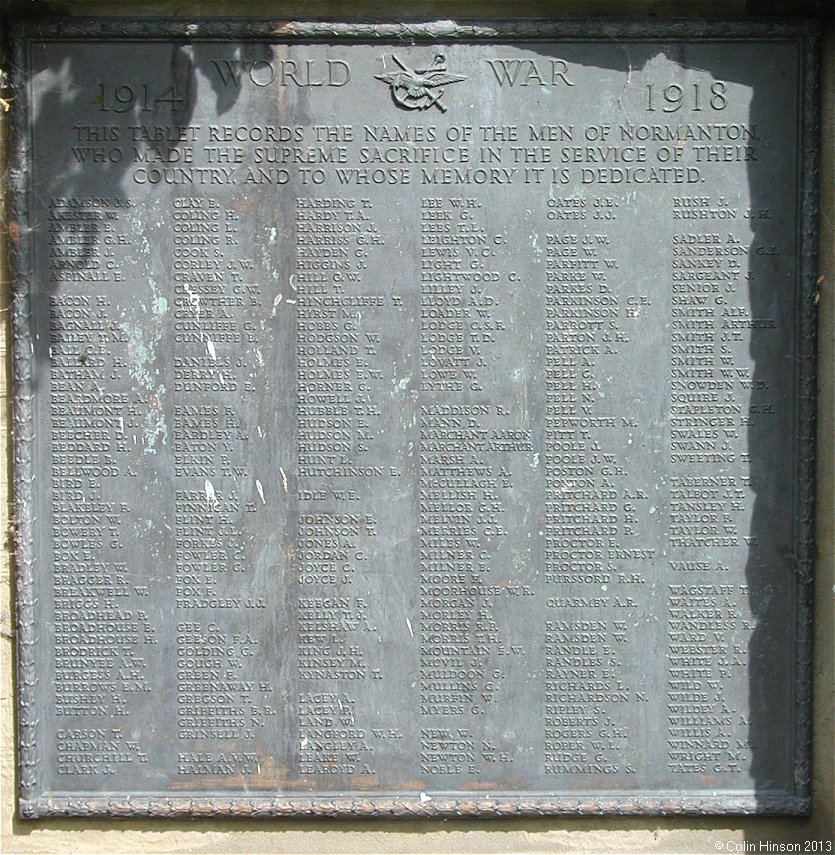The War memorial and plaques at Normanton